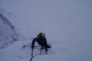 Oli swimming up Raeburn's Route