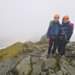 Image may contain: 2 people, people standing, mountain, outdoor and nature