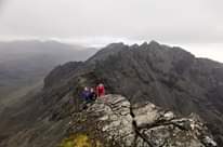 Image may contain: people standing, mountain, sky, outdoor and nature